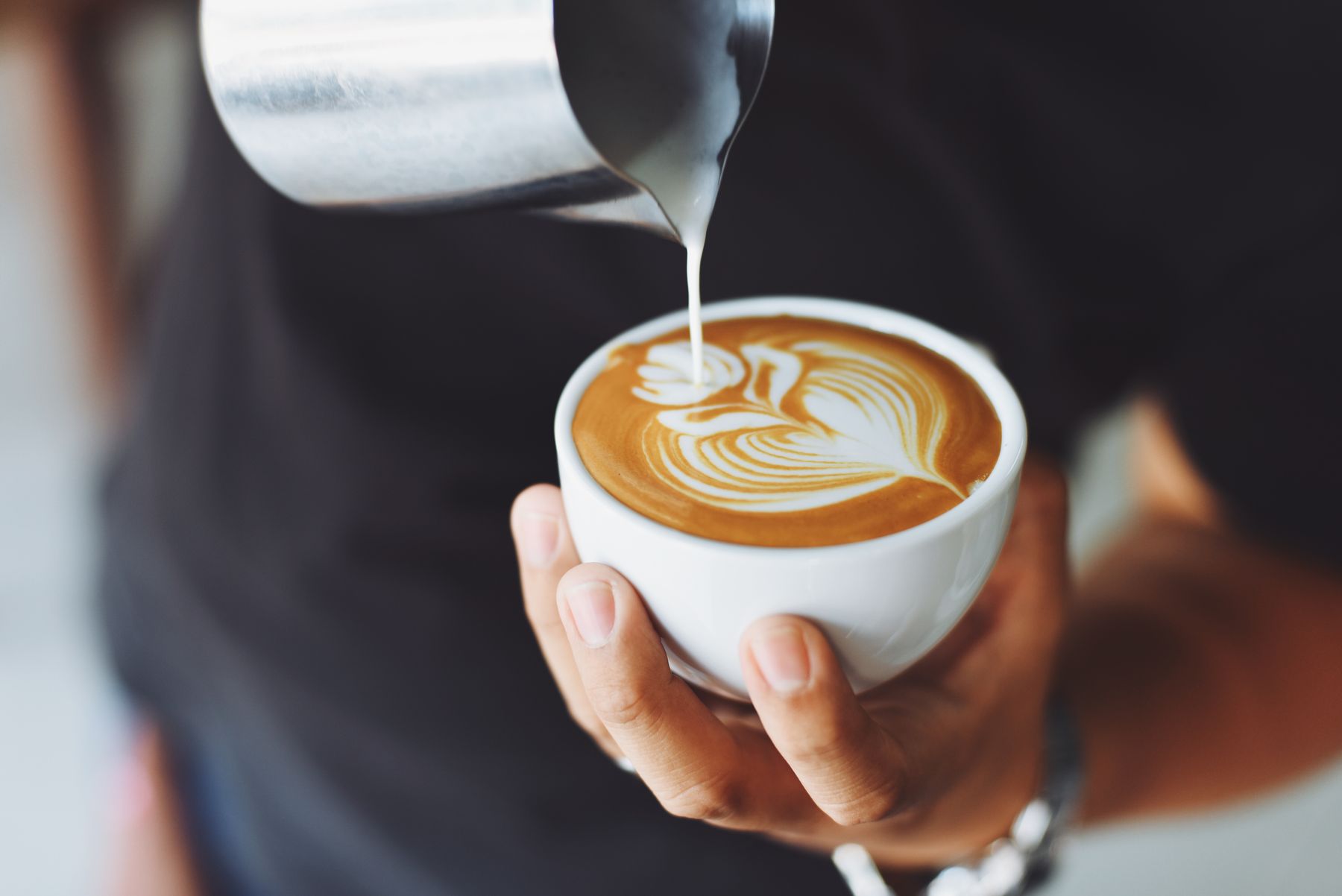 Freshly poured coffee with latte art